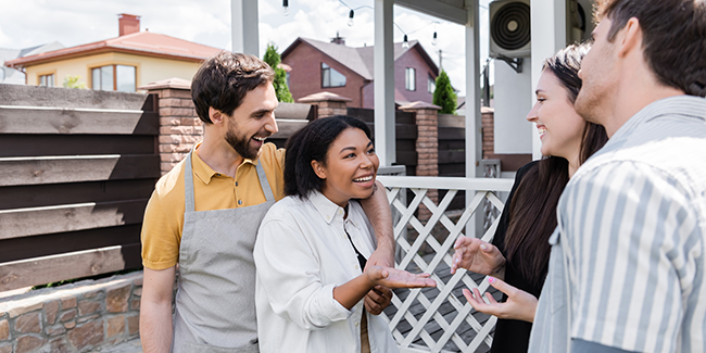 Neighbors get acquainted on the front lawn
